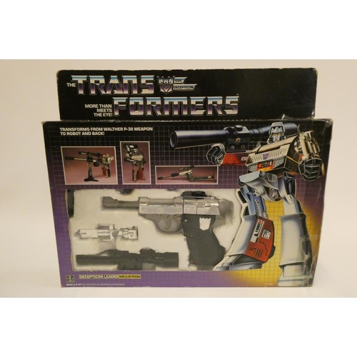 219 - Transformers Decepticon Leader Walther P-38 Megatron, boxed, figure fair, box af