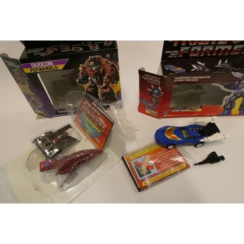 221 - Two boxed Transformers, comprising Duocon Flywheels and Autobot Warrior Tracks, figures fair, box af