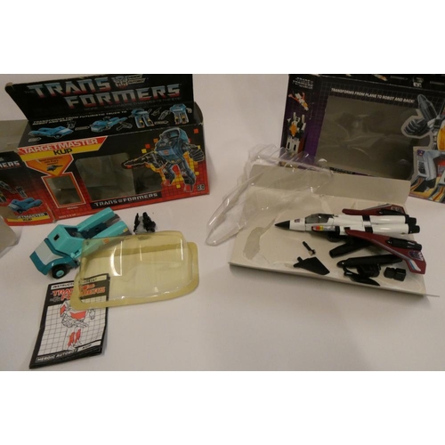 223 - Two boxed Transformers, comprising Targetmaster Kup and Decepticon Ramjet, figures fair, box af