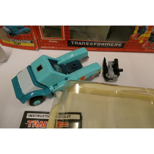 223 - Two boxed Transformers, comprising Targetmaster Kup and Decepticon Ramjet, figures fair, box af