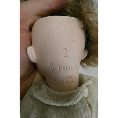 23 - Two Heubach socket head dolls, one 11 1/2