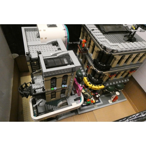 232 - Three boxes of built Lego buildings, unchecked for completeness