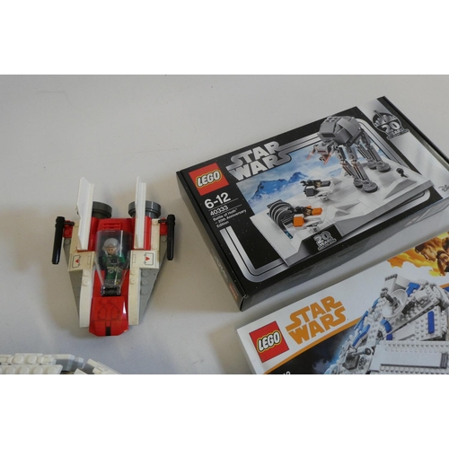 233 - A box of Star Wars Lego, including set 75212 (unboxed and unchecked), set 40333 unopened and another... 