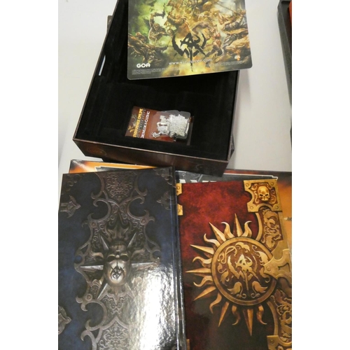 237 - A collection of Warhammer items, including a Age of Reckoning set containing Grumlock & Gazbag, some... 