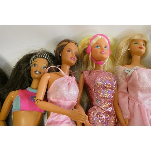 24 - A box of Barbie accessories, Ken dolls, two Sindy dolls and Hasbro celebrity dolls etc, including a ... 