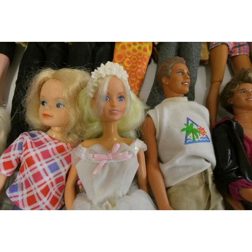 24 - A box of Barbie accessories, Ken dolls, two Sindy dolls and Hasbro celebrity dolls etc, including a ... 