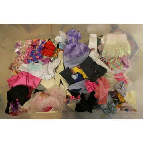 24 - A box of Barbie accessories, Ken dolls, two Sindy dolls and Hasbro celebrity dolls etc, including a ... 