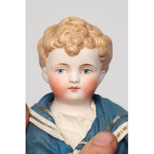 29 - A fine Simon & Halbig bisque shoulder head sailor boy doll, with moulded hair, painted features, pie... 