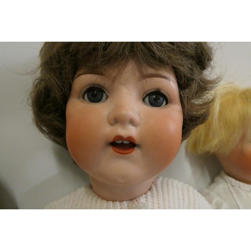 30 - Four vintage dolls, comprising an Armand Marseille 995 9 with sleeping eyes, an Armand Marseille 996... 