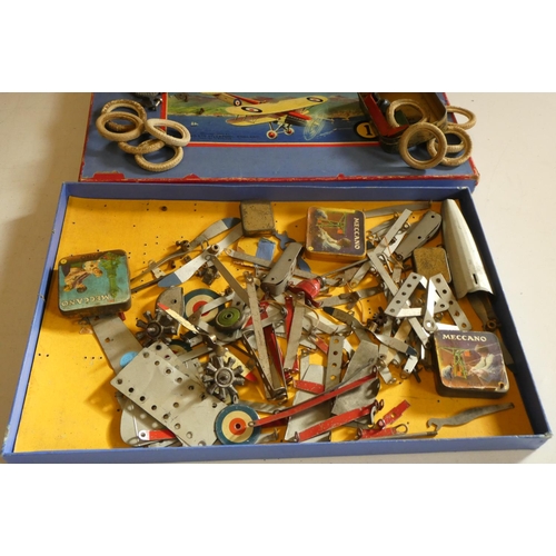 303 - Meccano No.0 Aeroplane Construction Kit, boxed, some parts missing, remaining parts in good to fair ... 