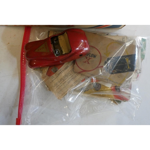 306 - Playworn and damaged Schuco clockwork cars, some items have been completely disassembled, others dam... 