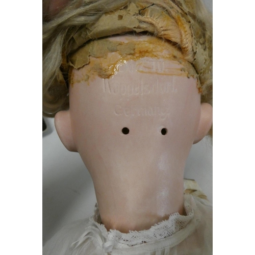 33 - A Heubach Koppelsdorf bisque socket head doll, with blue glass sleeping eyes, open mouth, teeth, blo... 