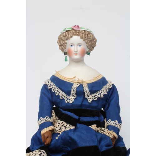 35 - A possible Dornheim Koch & Fischer bisque shoulder head doll, with moulded hair, painted features, p... 