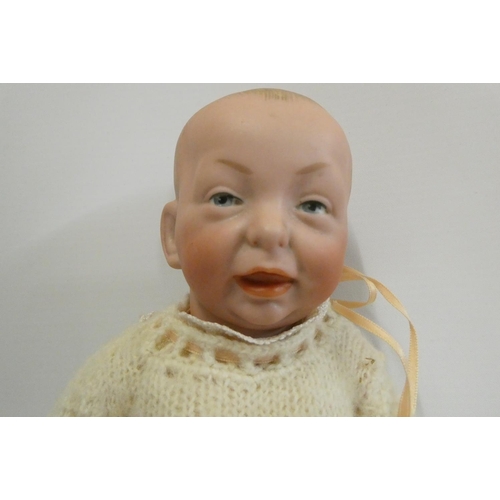 37 - A Kammer & Reinhardt bisque socket head character doll, with painted features, bent limb composition... 