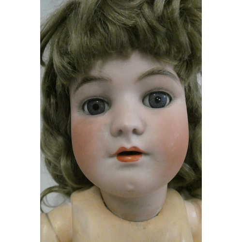 55 - A Heinrich Handwerck Simon & Halbig bisque socket head doll, with blue glass sleeping eyes, open mou... 