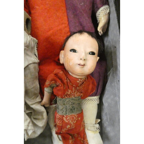 57 - Four collectors dolls, comprising a part Victorian peg doll, a composition Japanese doll, a composit... 