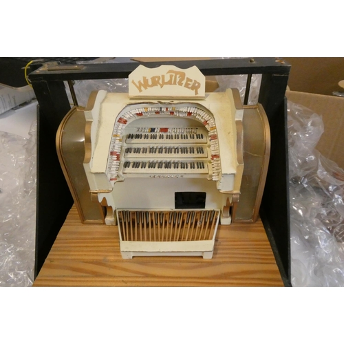 66 - A large collection of doll's house musical room and associated items, including a model Wurlitzer or... 