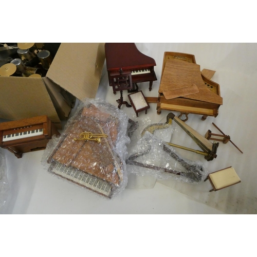 66 - A large collection of doll's house musical room and associated items, including a model Wurlitzer or... 