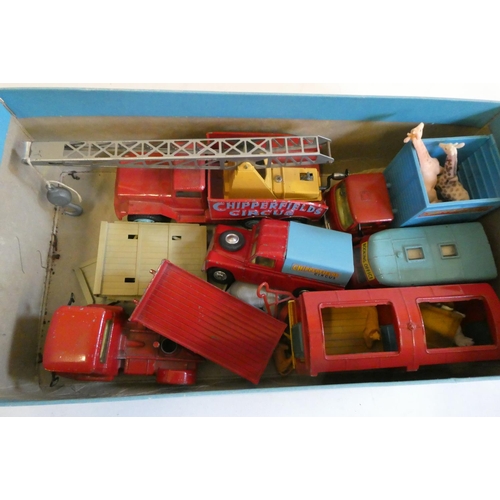 712 - Corgi circus vehicles including crane, animal transporter and booking office, condition fair.