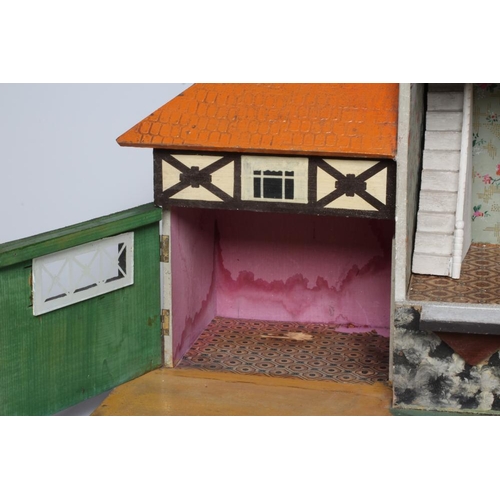 77 - A Bavarian style German wooden dolls house, early/mid 20th century, 1/16th scale, with 2 split level... 