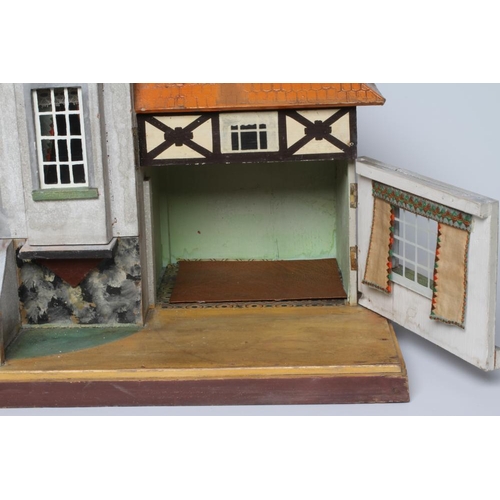 77 - A Bavarian style German wooden dolls house, early/mid 20th century, 1/16th scale, with 2 split level... 