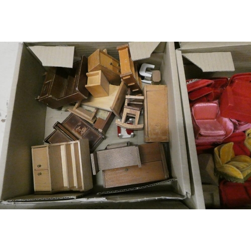 84 - Five boxes of dolls house furniture, comprising one box of upholstered sit on suites and four boxes ... 