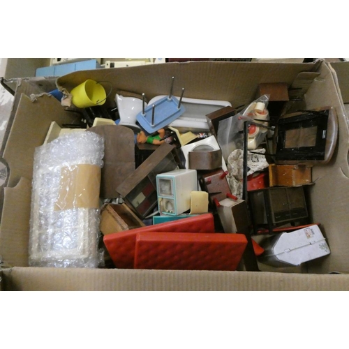 85 - Three boxes of mainly vintage dolls house furniture and accessories, including tin kitchen equipment... 