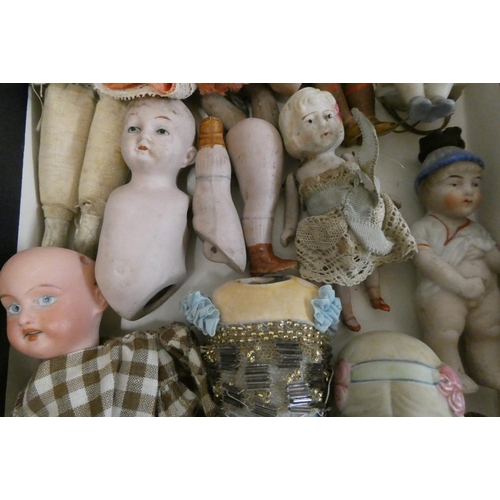 9 - Collection of miniature dolls, including an all bisque nippon doll, a Victorian china head doll and ... 