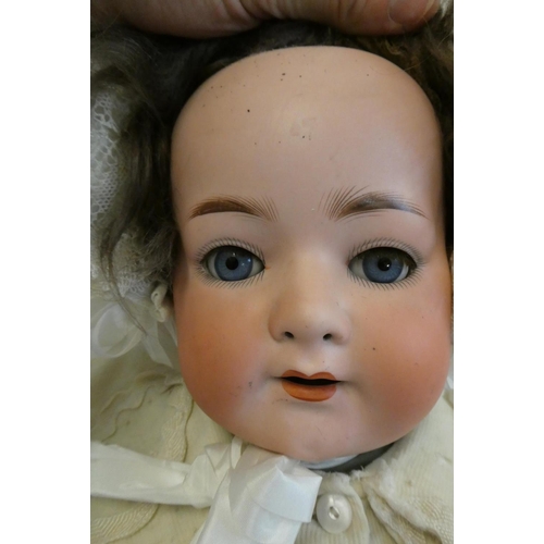 91 - A Heubach Koppelsdorf bisque socket head character doll, with blue glass sleeping eyes, open mouth, ... 