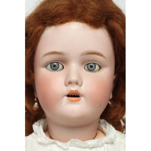 97 - A Handwerck Halbig bisque socket head doll, with blue glass sleeping eyes, open mouth, teeth, pierce... 