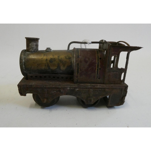 975 - Bing 0-4-0 single cylinder steam locomotive, body work rusting, cab roof and sprit burner missing, p... 