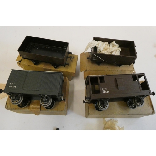 980 - Four Bassett-Lowke goods wagons, Winteringham, Leeds models, boxes fair, models good+