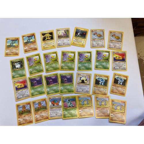 156 - Approximately 593 Pokemon cards, comprising 266 1999 Pokemon, 116 1999-2000 Pokemon, 92 1999 Energy,... 