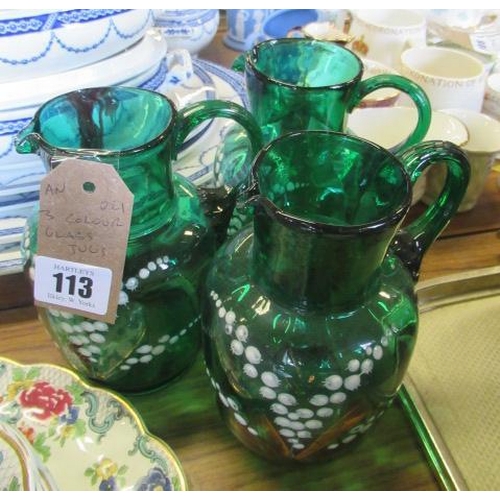 113 - THREE ANTIQUE COLOURED GLASS JUGS