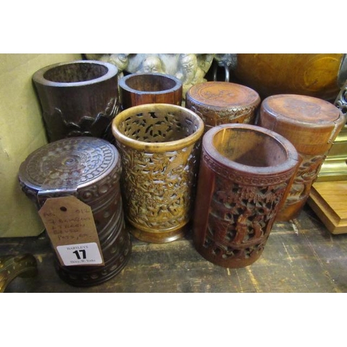 17 - SEVEN BAMBOO AND TREEN BRUSH POTS ETC