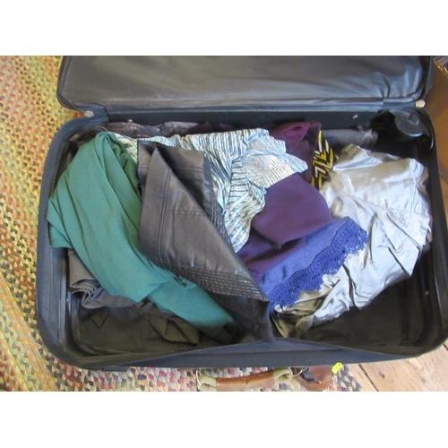 63 - SUITCASE OF CLOTHING