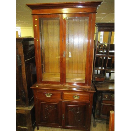 856 - GLAZED BOOKCASE ON CUPBOARD