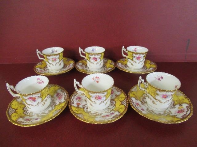 SIX MATCHING COALPORT YELLOW BATWING PATTERN CUPS AND SAUCERS