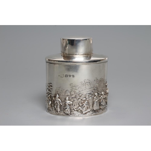 108 - A SILVER TEA CANISTER, maker's mark rubbed, Chester 1935, of oval section, the lower half chased and... 