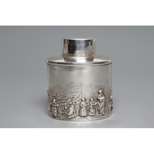 108 - A SILVER TEA CANISTER, maker's mark rubbed, Chester 1935, of oval section, the lower half chased and... 