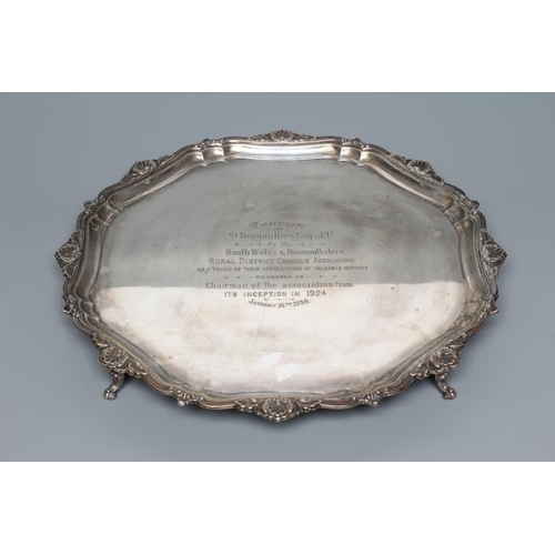 114 - A SILVER SALVER, possibly by Stevenson & Law, Sheffield 1932, of shaped circular form, centrally eng... 