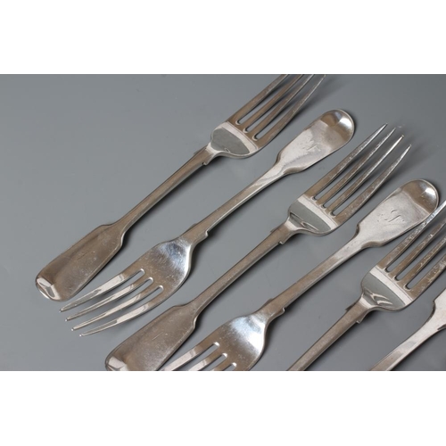 129 - A SET OF NINE VICTORIAN SILVER DESSERT FORKS, by Henry Holland, London 1862, in fiddle pattern, engr... 