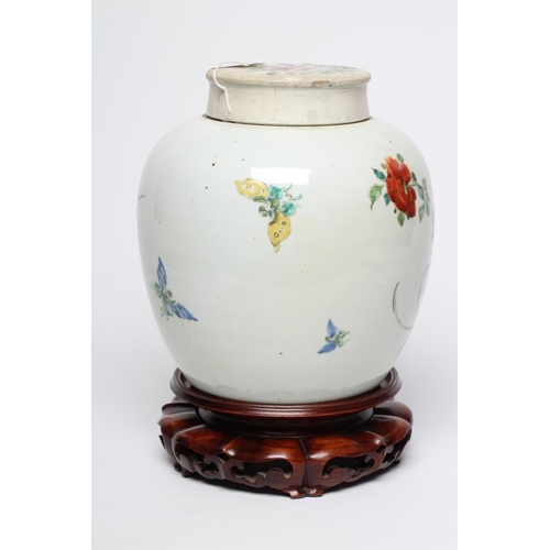 13 - A CHINESE PORCELAIN LARGE JAR AND COVER painted in colours with a finch perched upon a blossoming br... 