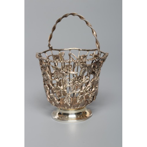 142 - AN EDWARDIAN SILVER WIREWORK SUGAR BASKET, by William Comyns, London 1902, with cast and applied str... 