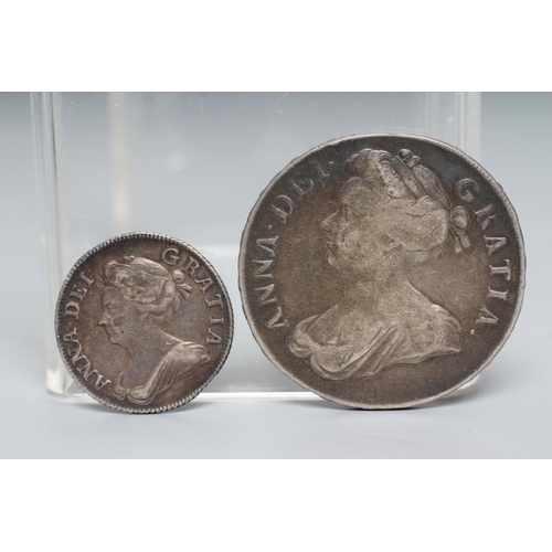 152 - TWO QUEEN ANNE SILVER COINS, comprising 1706 crown with crowned cruciform back, plumes and roses, an... 