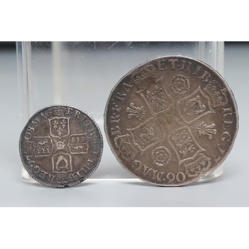 152 - TWO QUEEN ANNE SILVER COINS, comprising 1706 crown with crowned cruciform back, plumes and roses, an... 