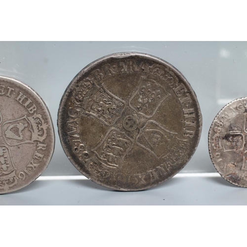 153 - THREE JAMES II SILVER COINS, comprising a 1688 crown with crown cruciform back, a 1686 half crown an... 