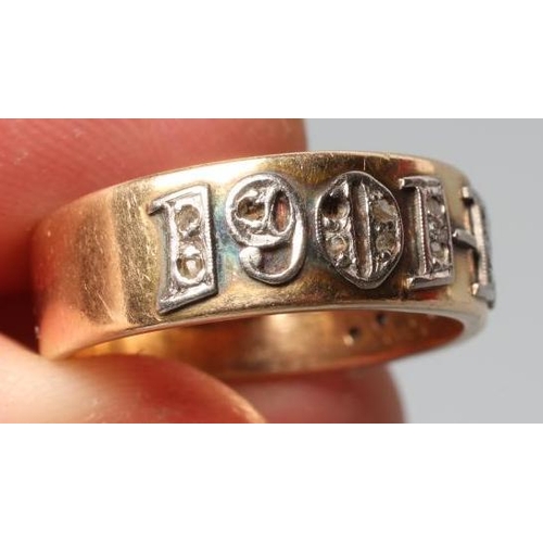 174 - A SILVER WEDDING ANNIVERSARY DIAMOND HALF HOOP BAND, the wide yellow band inset with the date 1901-1... 