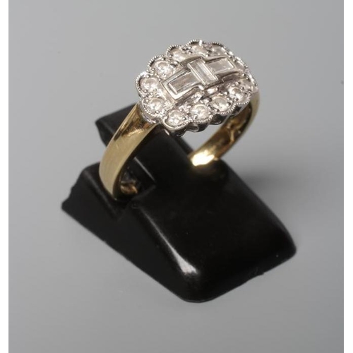 185 - AN ART DECO DIAMOND RING, the three baguette cut stones collet set to a border of twelve brilliant c... 