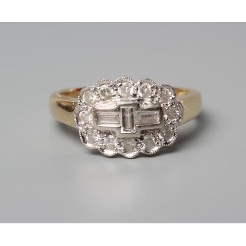 185 - AN ART DECO DIAMOND RING, the three baguette cut stones collet set to a border of twelve brilliant c... 